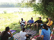 Naftaly Ngugi speaks with youth at UNESCO Youth Academy sponsored by World Genesis Foundation in Romania