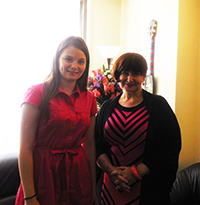 Romanian Ambassador Simona-Mirela Miculescu with student Gabriela Repanovici at meeting with World Genesis Foundation in New York City